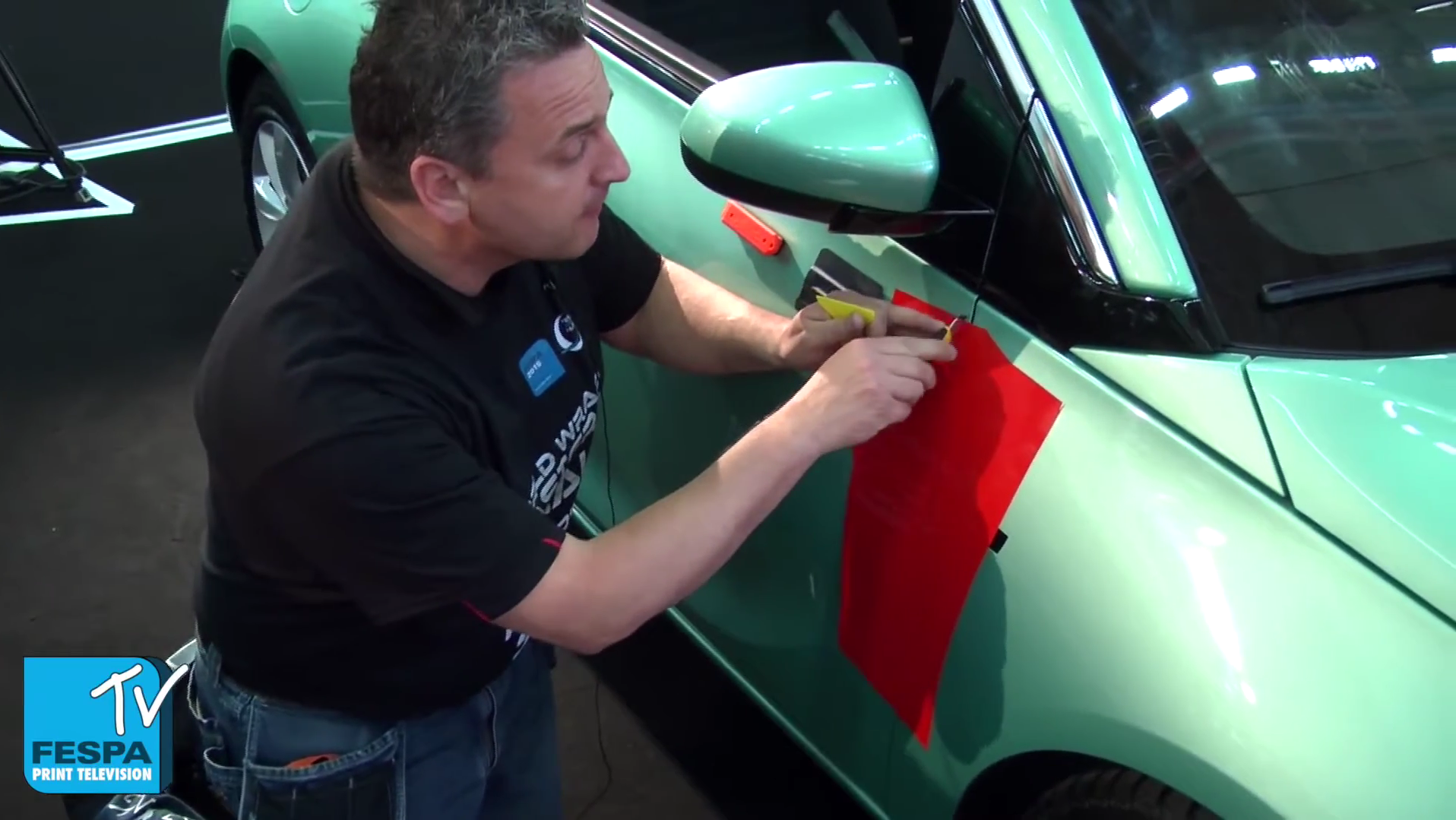 Ole Solskin Ravn, Head Judge for the World Wrap Masters talks us through a very simple trick that allows you to access the gap between the front door and front wing when wrapping a car. Not only that but the trick allows you to get enough purchase to securely fasten the vinyl on the backside of the door without even needing to open it.