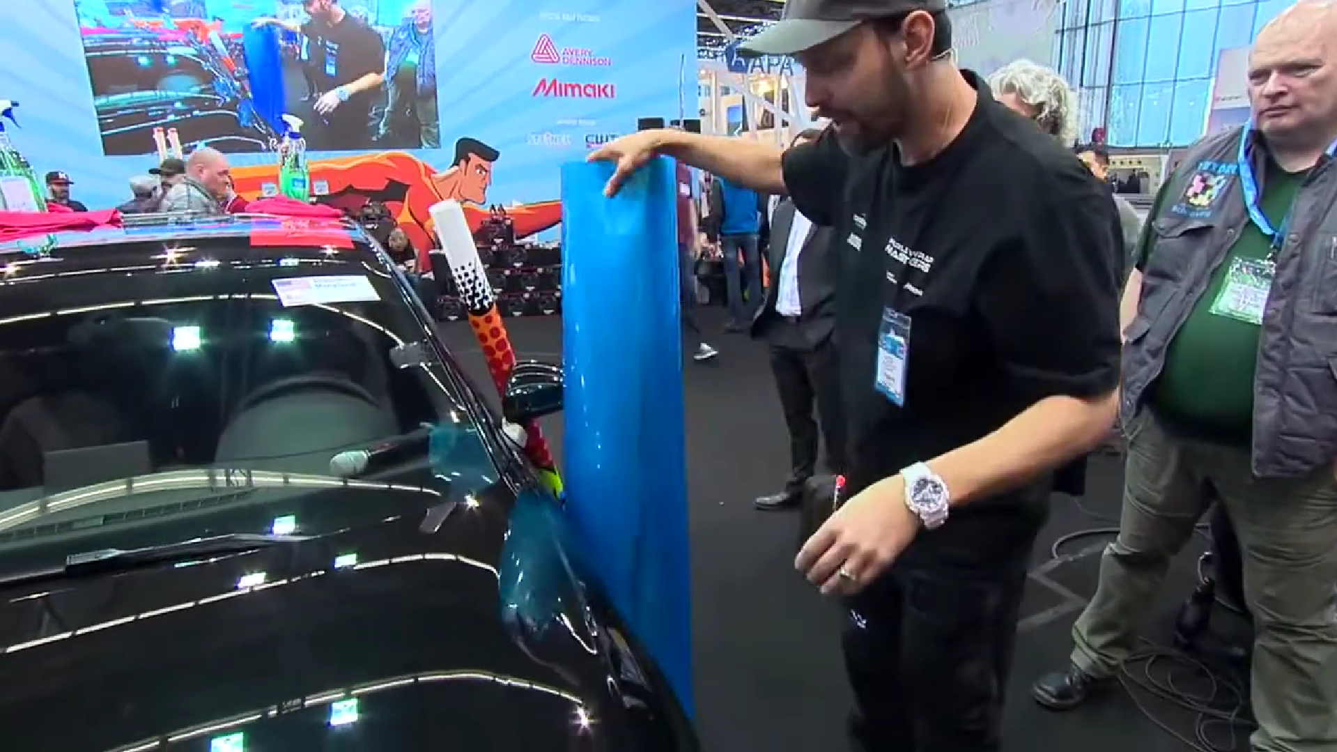 What makes wrapping a car difficult? Bumpers, door handles and mirrors. The reason for this is the film tends to bunch up on the corners which can lead to overstretching, wrinkles and durability issues. In this noon demo at FESPA Digital 2016, Head Judge Ole Solskin Ravn and Judge Justin Pate of TheWrapInstitute team-up to show two ground breaking techniques: triangles and cold pre-stretch which neutralize the curves so the car essentially becomes flat. This results in dramatically faster installs with higher quality and long term durability.