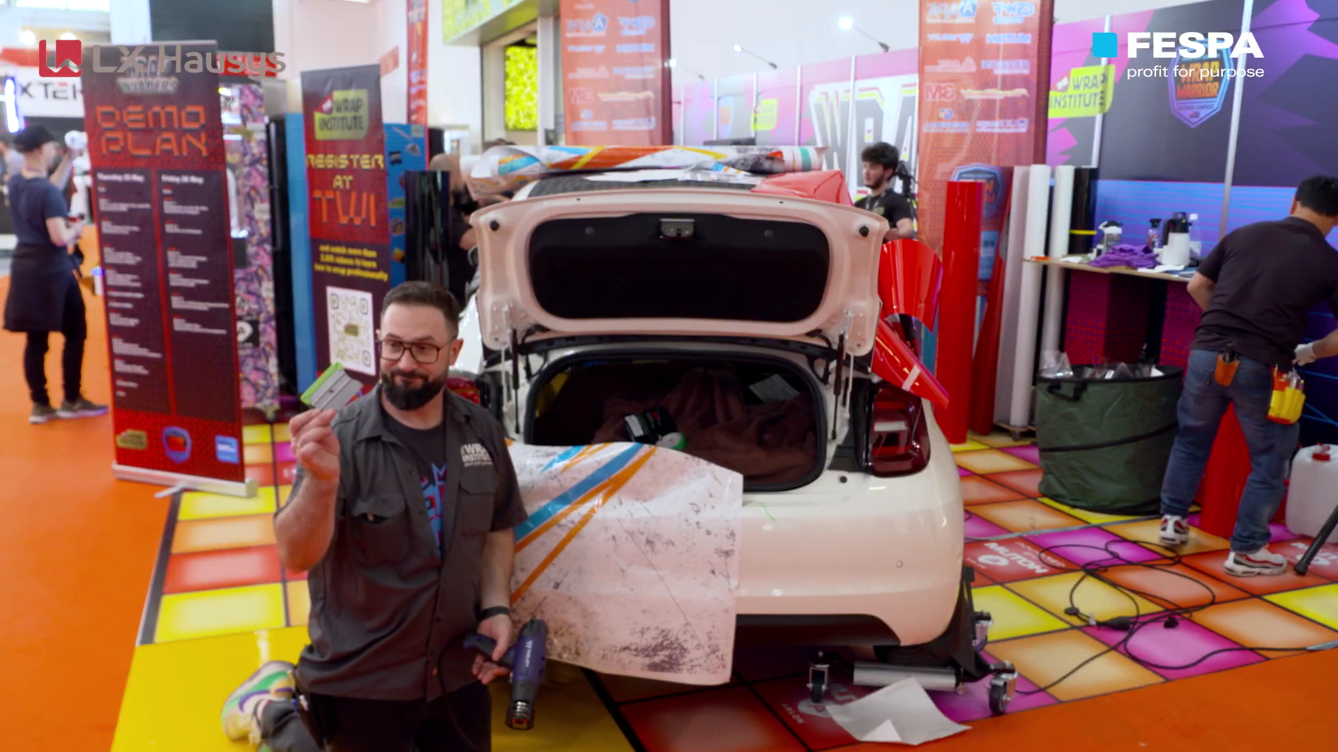 Rainer Lorz from the Wrap Institute shares tips on how to successfully wrap the back bumper of car. During this training demo Rainer demonstrates this on a Fiat 500 car at FESPA Global Print Expo 2023 in Munich. Choosing the right material and vinyl is crucial in executing a successful wrap. For more information on the Wrap Institute please visit: https://wrapinstitute.com/ This training demo took place alongside the World Wrap Masters Europe and Final 2023 competitions, where the best vehicle wrappers from around the world compete.