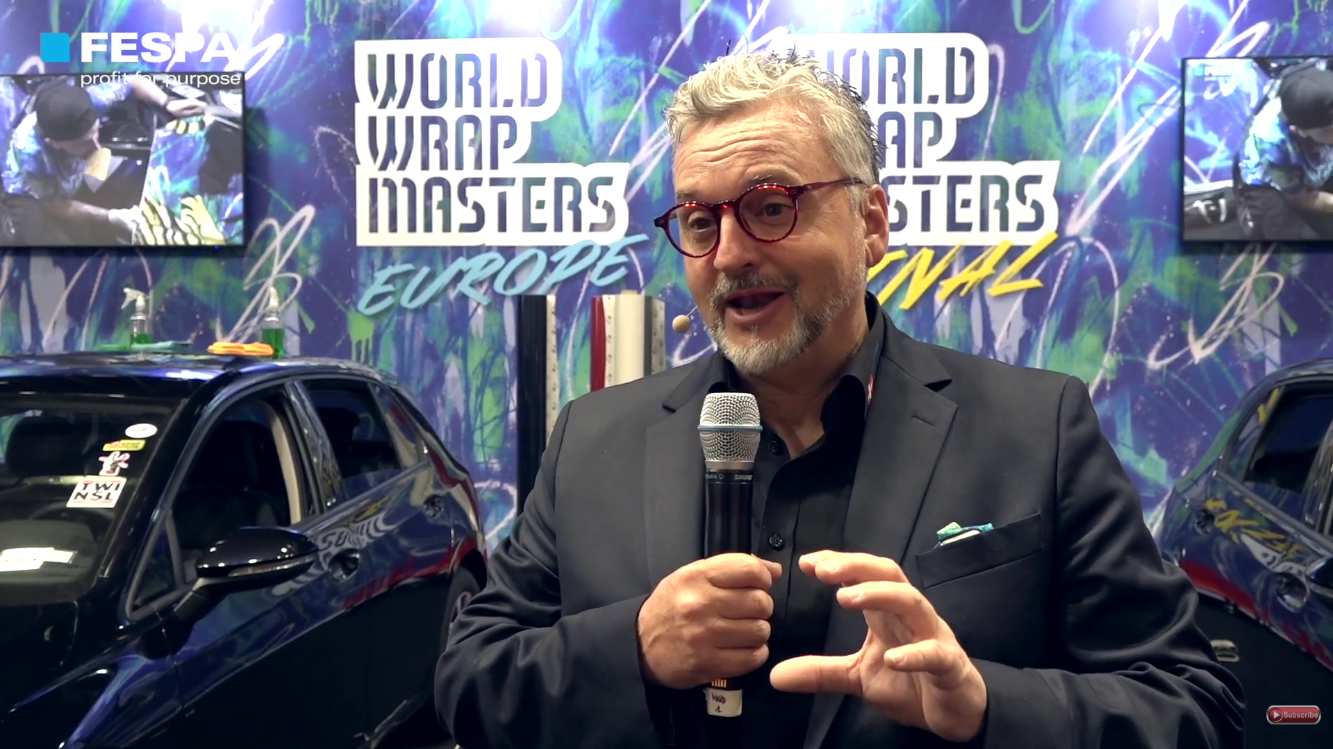 We speak to Ole Solskin, our guest MC at at World Wrap Masters Europe and World Wrap Masters Final 2022 competitions that took place at FESPA Global Print Expo 2022 in Berlin. Ole has had a long career in the industry, he is a tinting and wrapping expert and owns Suntin A/S, Denmark. Ole shares his thoughts on this year's competitions after COVID. Ole comments that competitors can learn and see new tips and tricks by participating in these competitions. Ole describes World Wrap Masters as 
