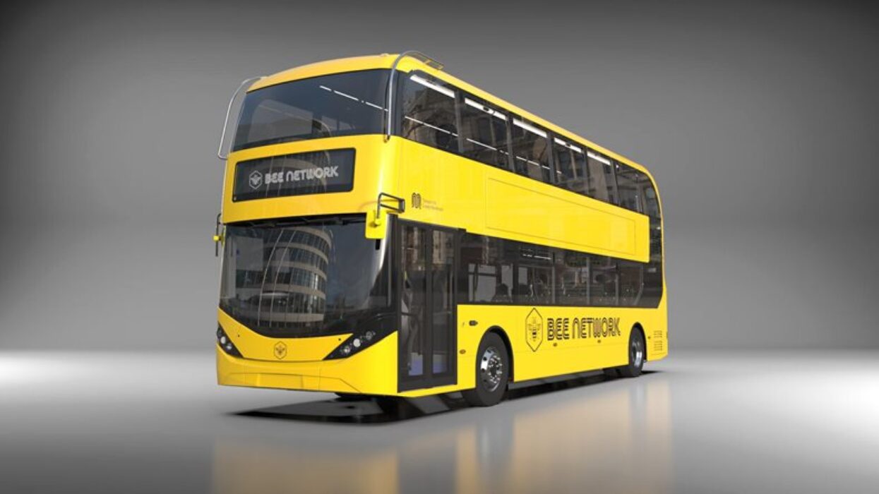 Bright yellow double-decker bus wrapped with the Bee Network logo and branding.